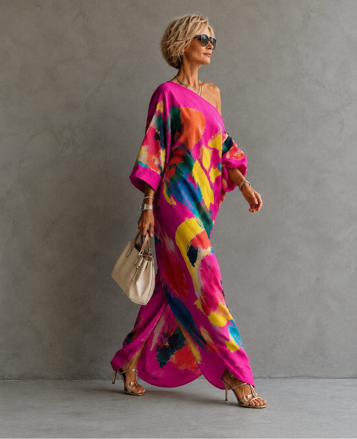 Adeline abstract print maxi dress by Bennett and Lowe featuring flowing fabric and vibrant geometric patterns.