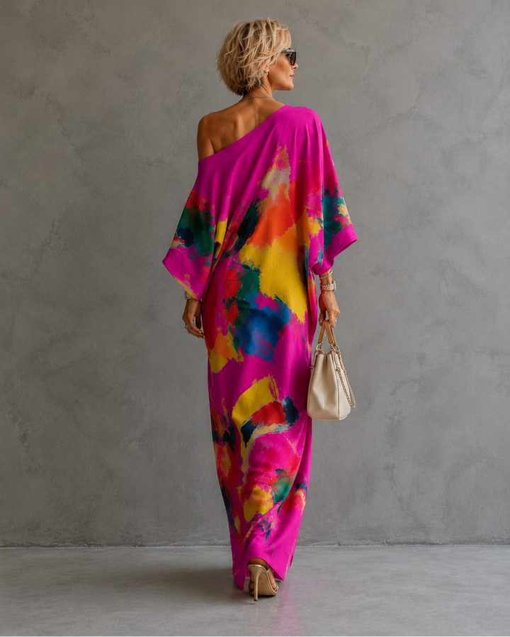 Adeline Bennett and Lowe abstract print maxi dress featuring flowing fabric and a stylish, colorful design.