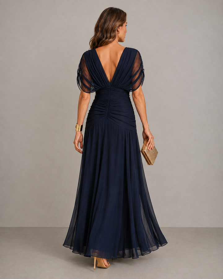 Willow pleated flowing midi dress by Bennett and Lowe, featuring a lightweight, elegant design with soft fabric and a flattering fit.