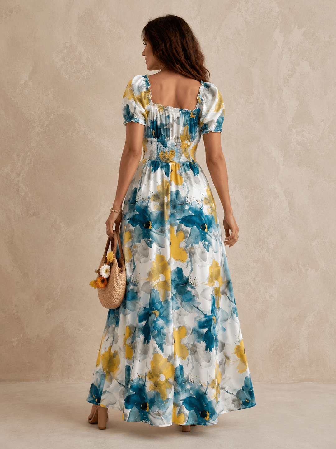 Delphine floral V-neck maxi dress by Bennett and Lowe, featuring shirred bodice and flowing skirt in vibrant floral print.