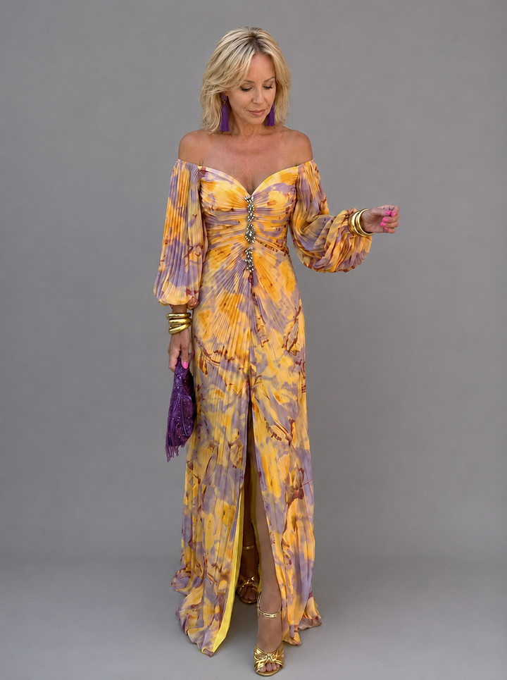 Floral deep-V maxi dress for women by Bennett and Lowe featuring a flowing design and vibrant floral pattern.