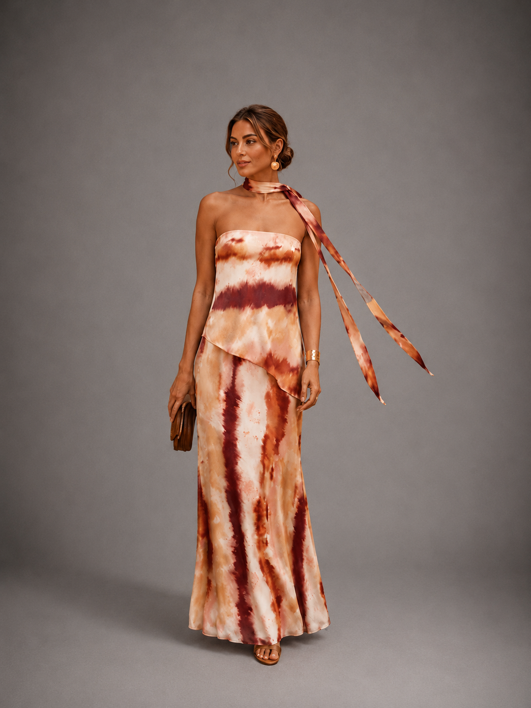 Printed strapless maxi dress for women by Bennett and Lowe, featuring a flowing design and vibrant floral pattern.