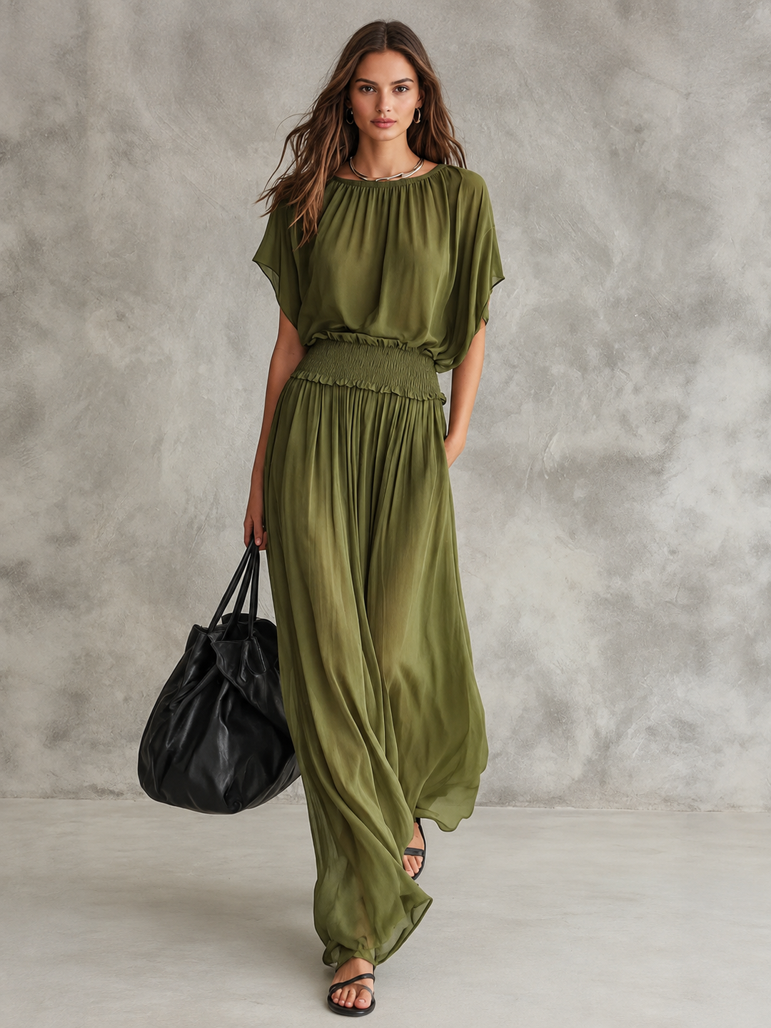 Odette structured drape maxi dress by Bennett and Lowe, featuring elegant flowing fabric and a sophisticated silhouette.