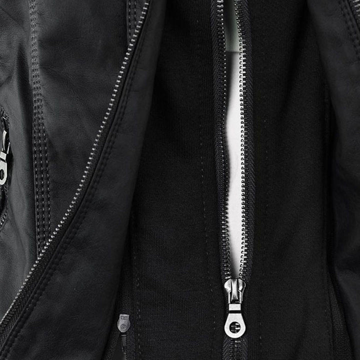 Bennett and Lowe Callista hooded moto jacket for women, close-up view showing black leather-style material and front zipper detail.