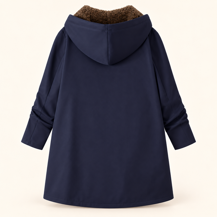 Heather Bennett & Lowe hooded longline coat with dark blue exterior and brown sherpa lining, shown in the image.