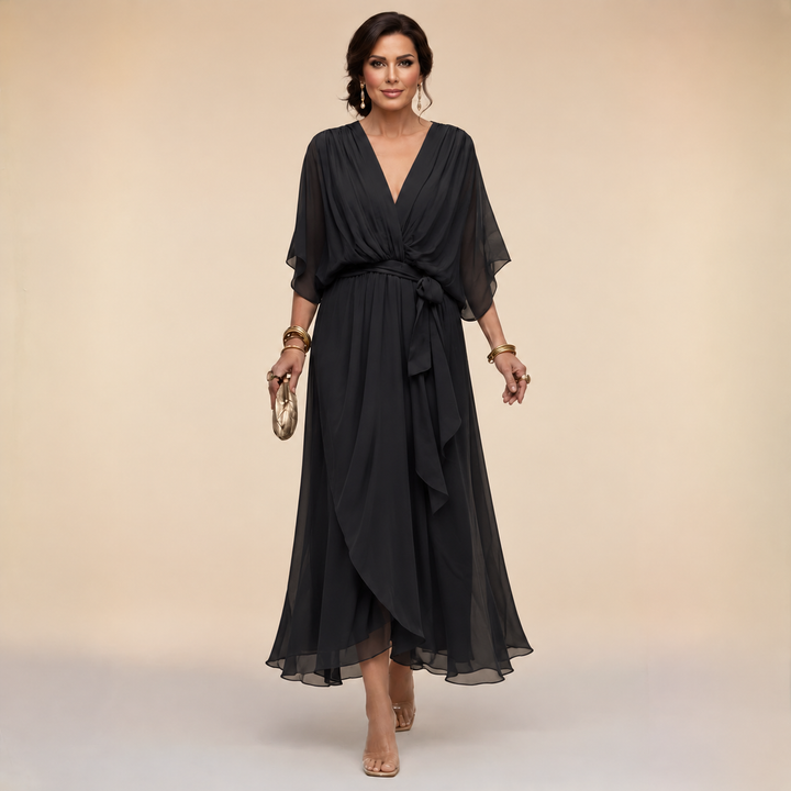 Elegant black chiffon V-neck dress by Bennett and Lowe, featuring a flowing silhouette and intricate detailing.
