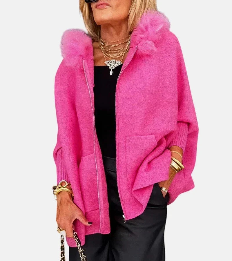Bennett and Lowe Annabelle faux-fur collar button-front women's jacket displayed on a hanger with a neutral background.