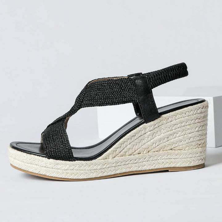 Handwoven Aroa wedge sandals by Bennett and Lowe with natural fiber straps and a comfortable wedge heel.