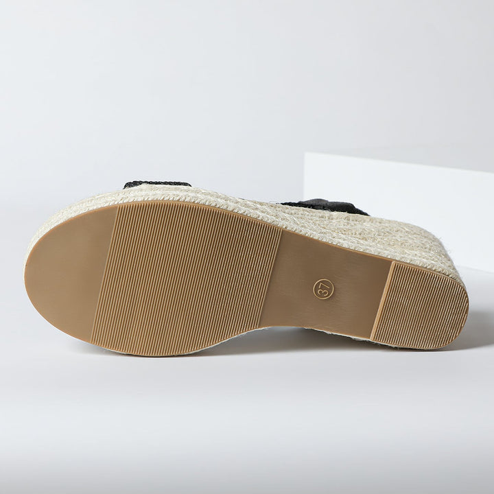 Handwoven Aroa wedge sandals by Bennett and Lowe with natural fiber straps and wooden wedge heel, stylish and comfortable footwear.