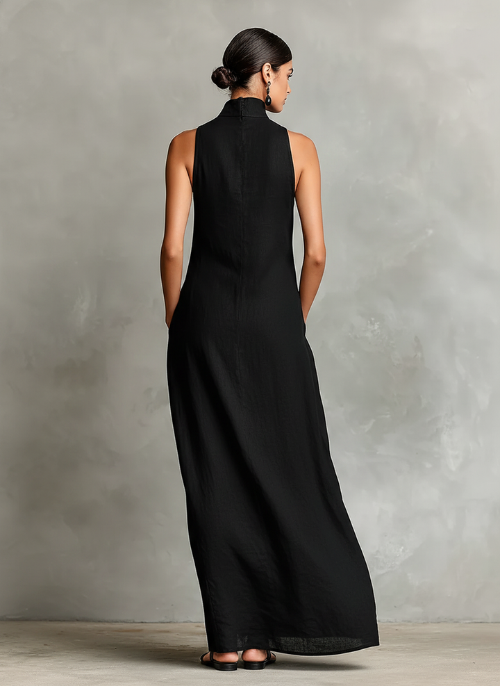 Chrissy high-neck pocket maxi dress by Bennett and Lowe, featuring a flowing silhouette and side pockets, in a stylish design.