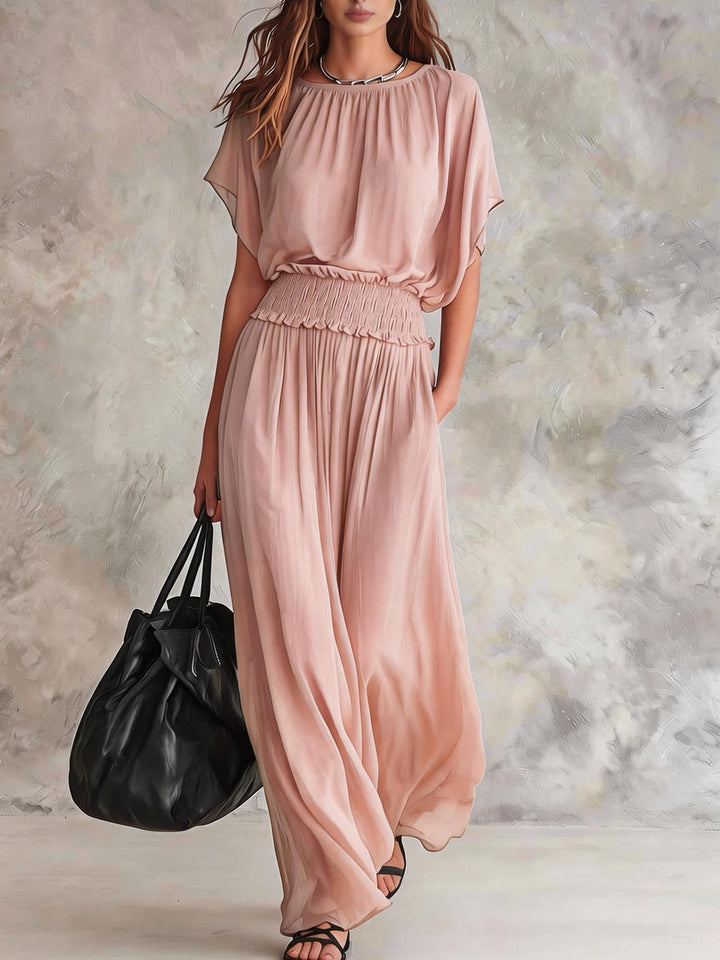 Romi wide-leg draped set by Bennett and Lowe featuring flowing fabric and a relaxed fit, shown on a model.