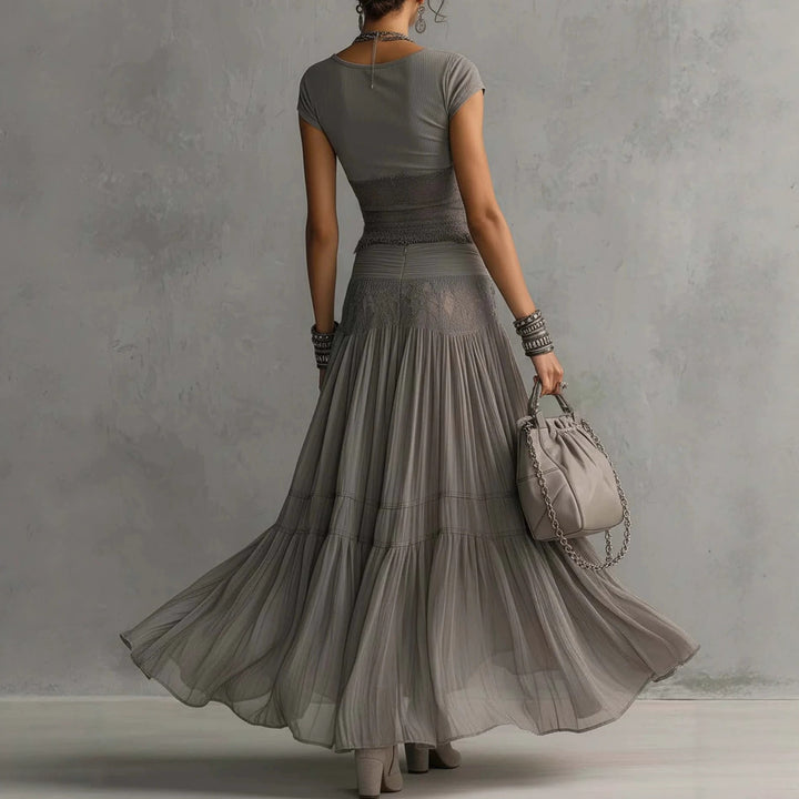 Olivia lace-paneled skirt set by Bennett & Lowe, featuring a stylish matching top and skirt with intricate lace details.