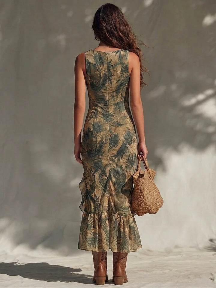 Tropical Savannah midi dress by Bennett and Lowe featuring ruched details and vibrant tropical print, sleeveless with a fitted silhouette.