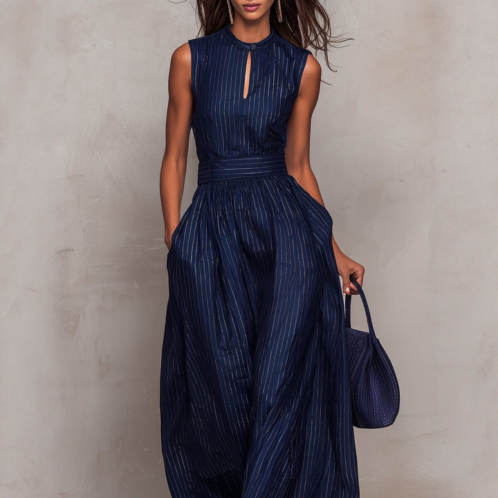Celeste metallic pinstripe jumpsuit for women by Bennett and Lowe, featuring a sleek, fitted design with metallic pinstripe fabric.