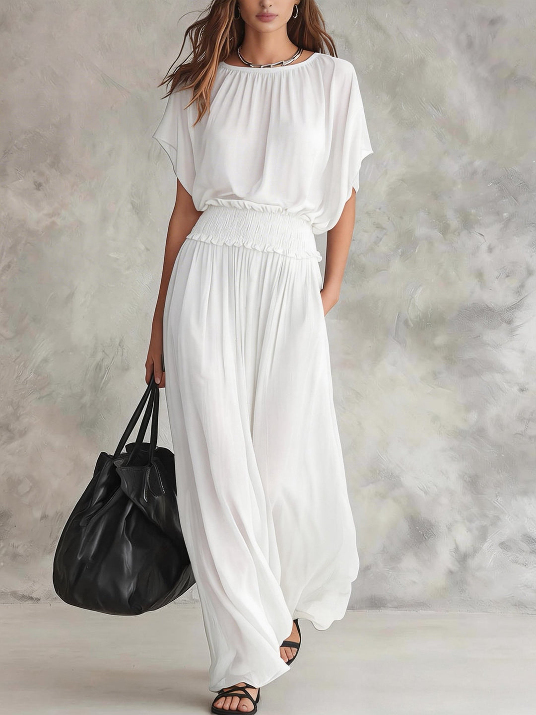 Romi wide-leg draped set by Bennett and Lowe featuring a stylish, flowing design on a model.