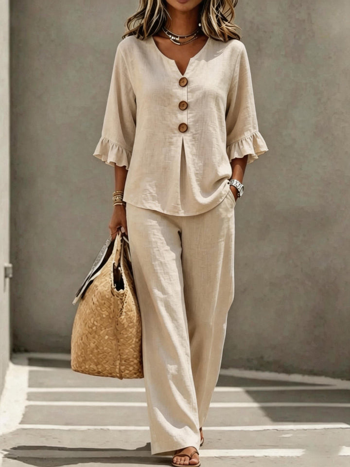 Sienna ruffle-sleeve two-piece women's set by Bennett and Lowe, featuring a stylish top and matching skirt in a vibrant design.