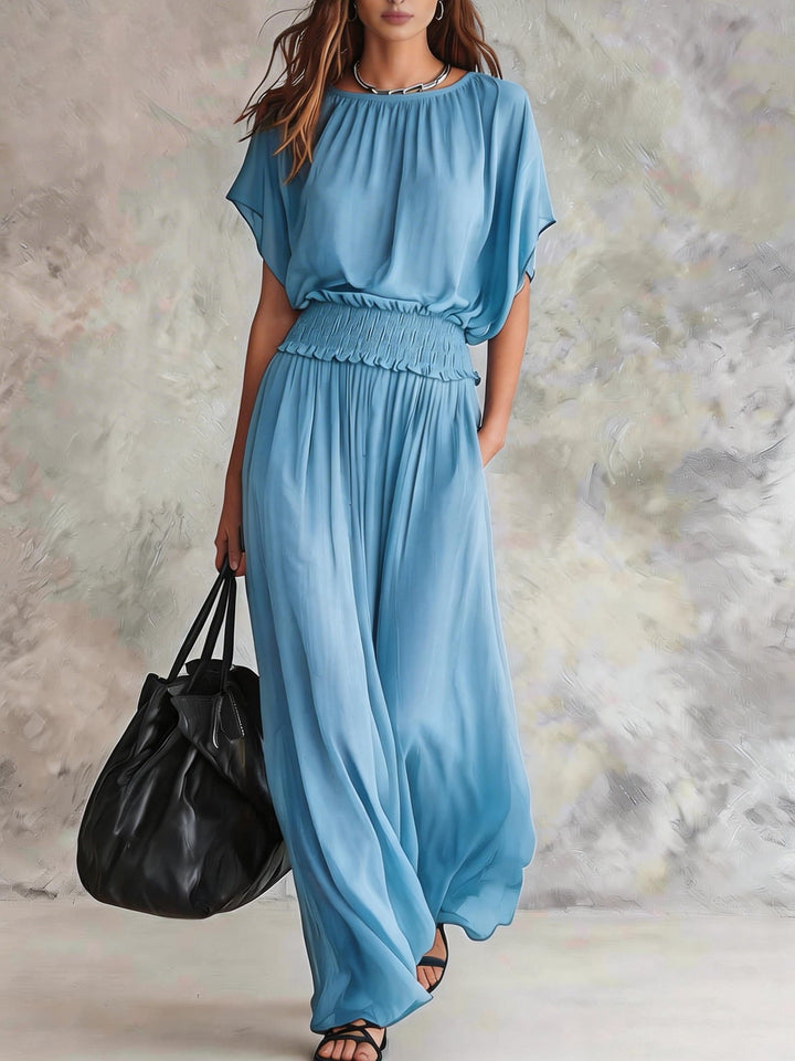 Romi wide-leg draped set by Bennett and Lowe, featuring flowing fabric and relaxed fit, shown on a model against a neutral background.