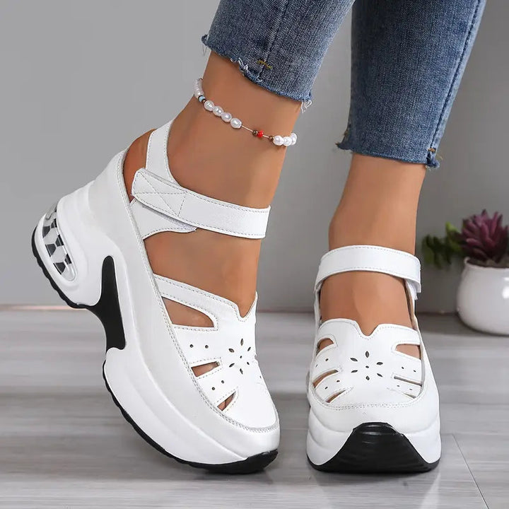 Bennett and Lowe Odile cutout platform wedge sneaker in black, side view