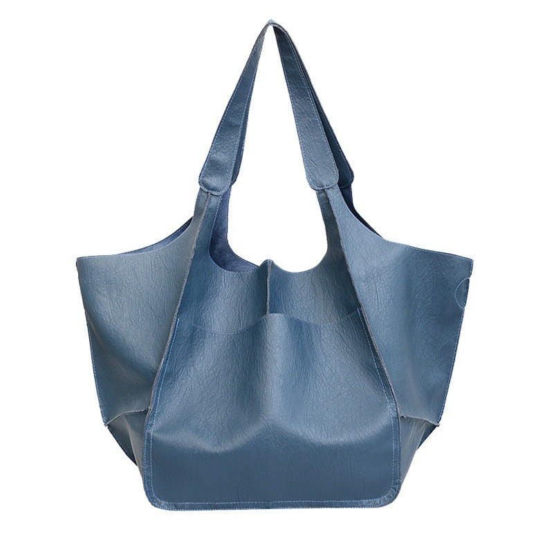 Bennett and Lowe Ruth pebbled leather tote bag with adjustable strap, stylish and functional for everyday use.