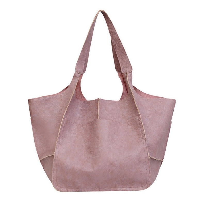 Bennett and Lowe Ruth pebbed leather tote bag with adjustable strap, featuring a spacious interior and stylish design.