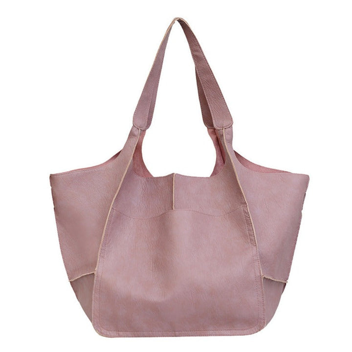 Bennett and Lowe Ruth pebbed leather tote bag with adjustable strap, featuring a spacious interior and stylish design.
