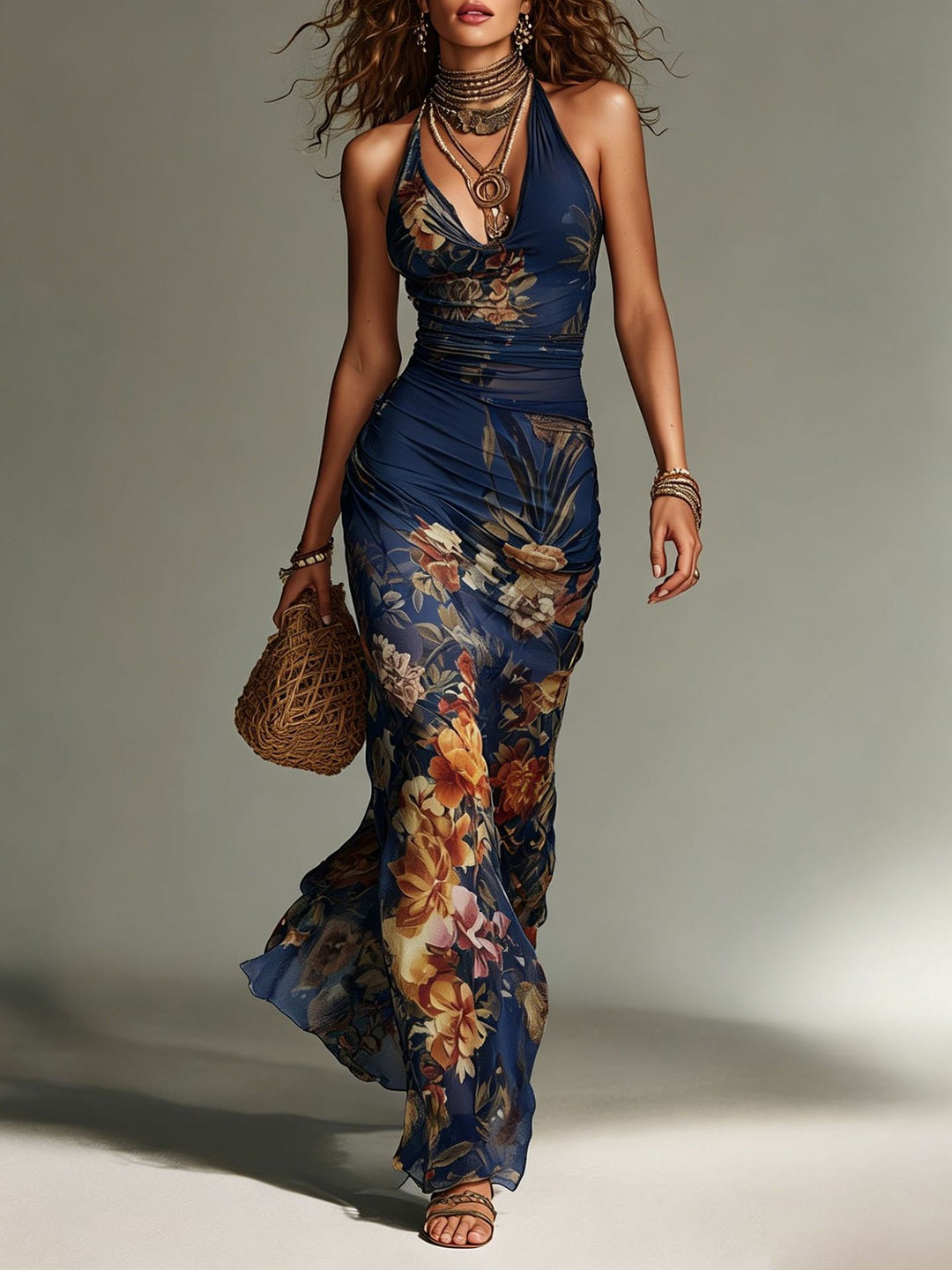 Navy floral ruched halter maxi dress for women by Bennett and Lowe, featuring a flowing silhouette and floral print.