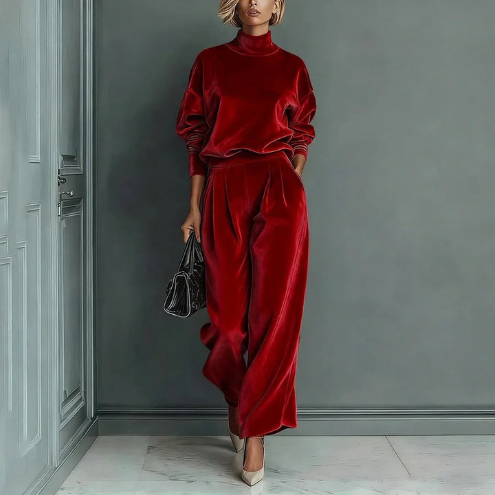 Renee Bennett and Lowe statement-sleeve pants set featuring wide-leg pants and a matching top with dramatic sleeve details.