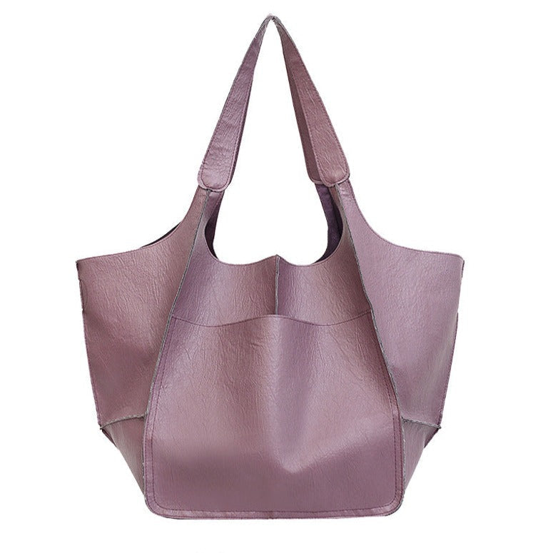 Bennett and Lowe Ruth pebble leather tote bag with adjustable strap, showing the textured leather surface and spacious design.