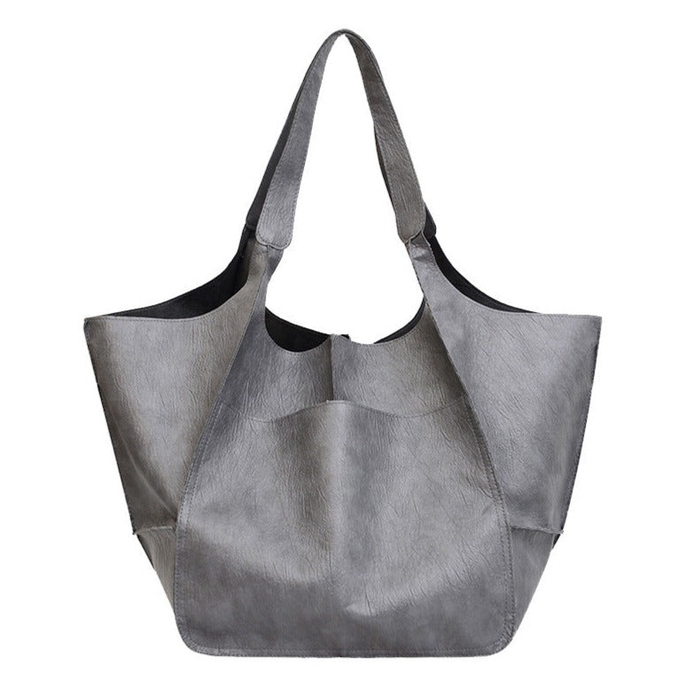 Ruth pebbed leather tote bag with adjustable strap from Bennett and Lowe, featuring a stylish and spacious design.