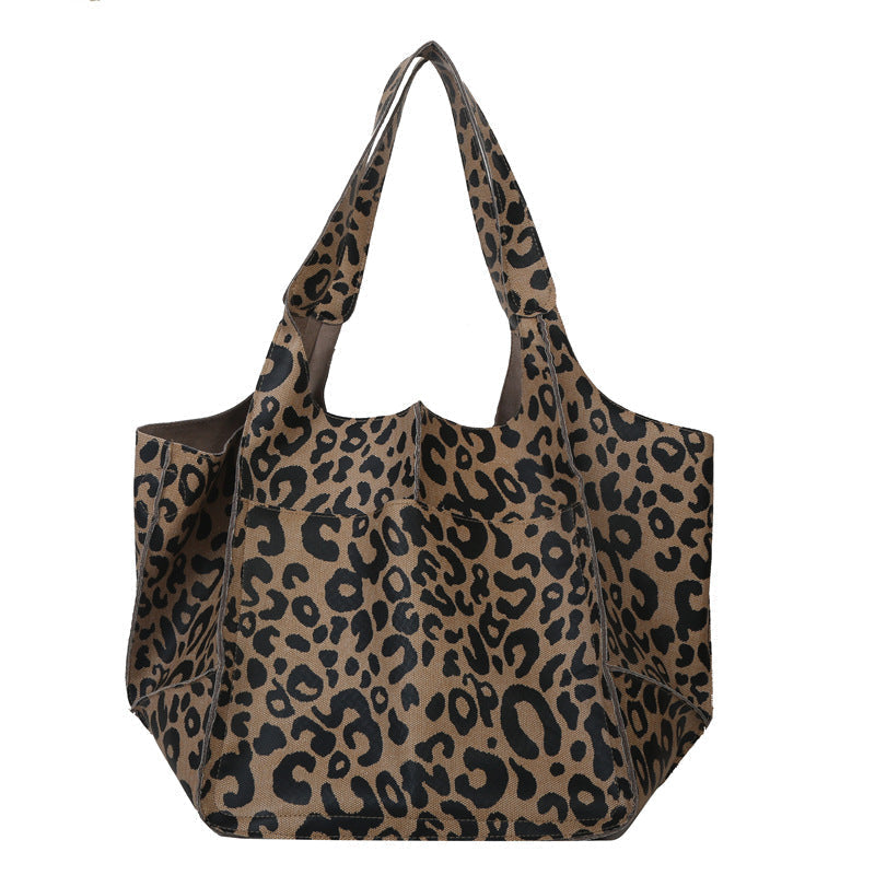 Bennett and Lowe Ruth pebbled leather tote bag with adjustable strap, featuring a sleek, durable design and classic style.