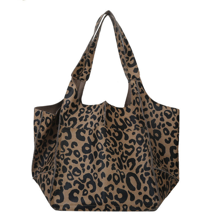 Bennett and Lowe Ruth pebbled leather tote bag with adjustable strap, featuring a sleek, durable design and classic style.