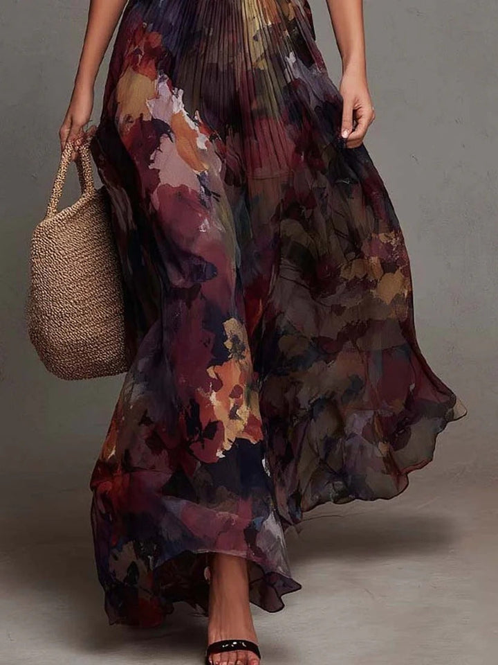 Watercolor floral pleated maxi dress for women by Bennett and Lowe featuring camellia design and elegant flowing fabric.