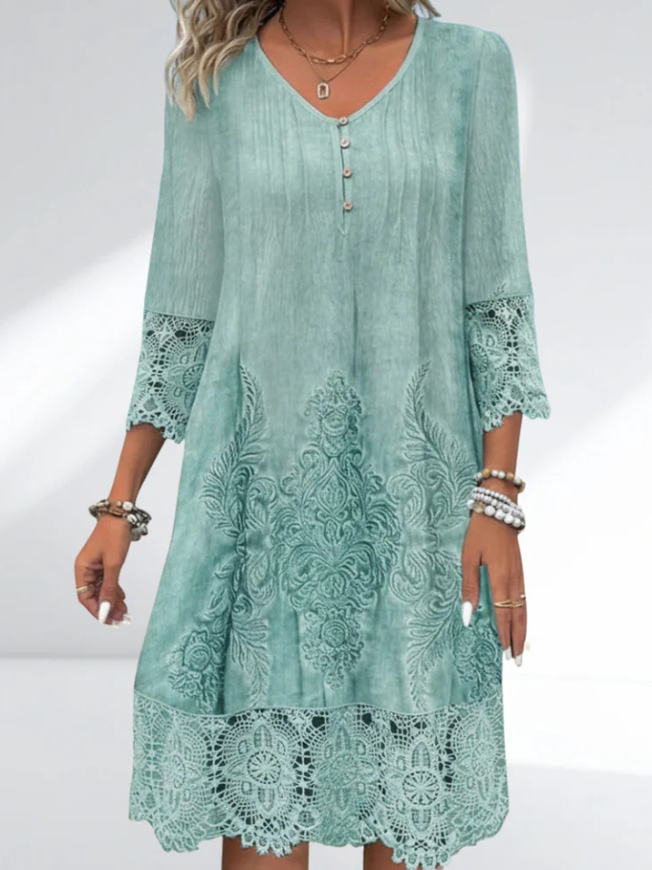 Lace cocktail midi dress named Celeste by Bennett and Lowe, shown on a model with elegant design and intricate lace details.