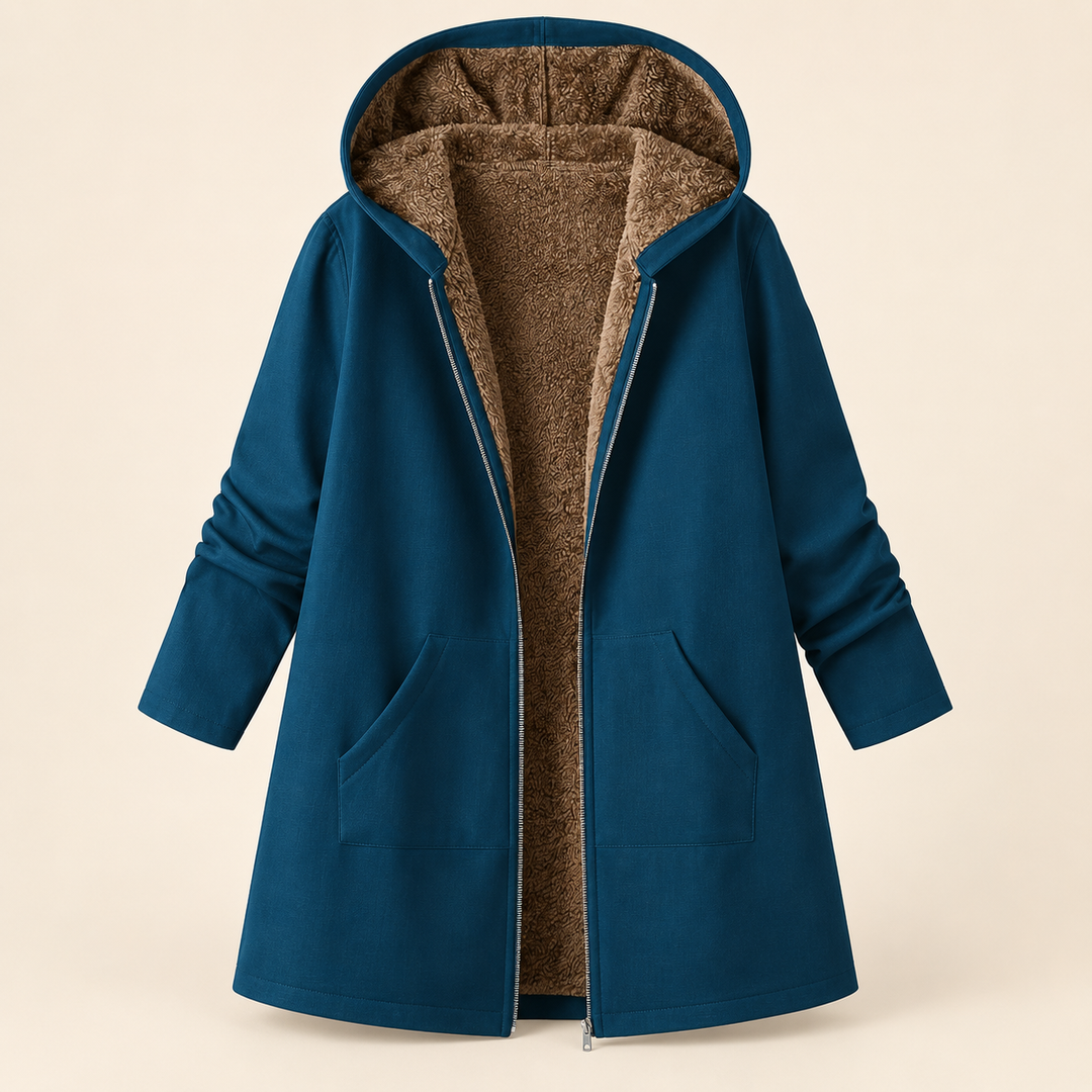 Heather Bennett & Lowe hooded longline coat in petrol blue with brown shearling lining, featuring a cozy hood and extended length.
