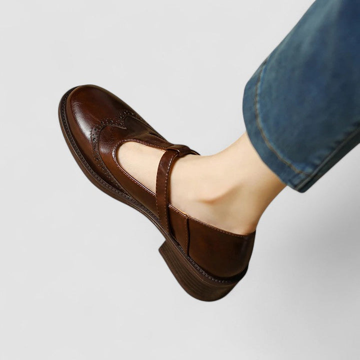 Daisy casual Mary Jane shoes by Bennett and Lowe featuring black leather straps and rounded toe on a neutral background.