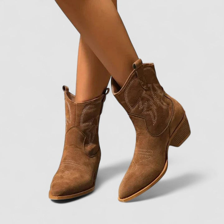 Lillian buckle ankle boot for women by Bennett and Lowe, featuring a stylish leather design with buckle accents and a low heel.