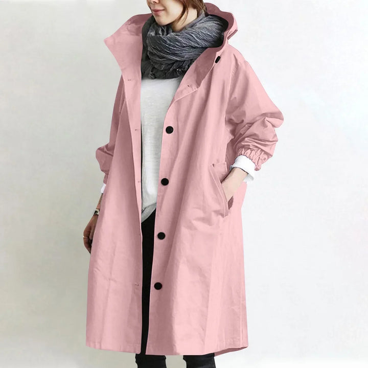 Eloise Bennett and Lowe hooded longline trench coat shown in black, featuring a stylish hood and sleek long silhouette.