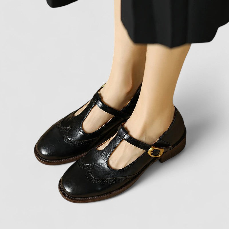 Daisy casual Mary Jane shoes by Bennett and Lowe featuring black leather straps and rounded toe on a white background.