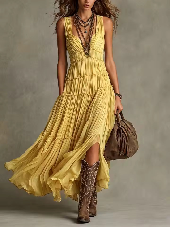 Arabella tiered ruffle chiffon maxi dress by Bennett and Lowe displayed on a model showcasing its flowing design and elegant ruffle details.
