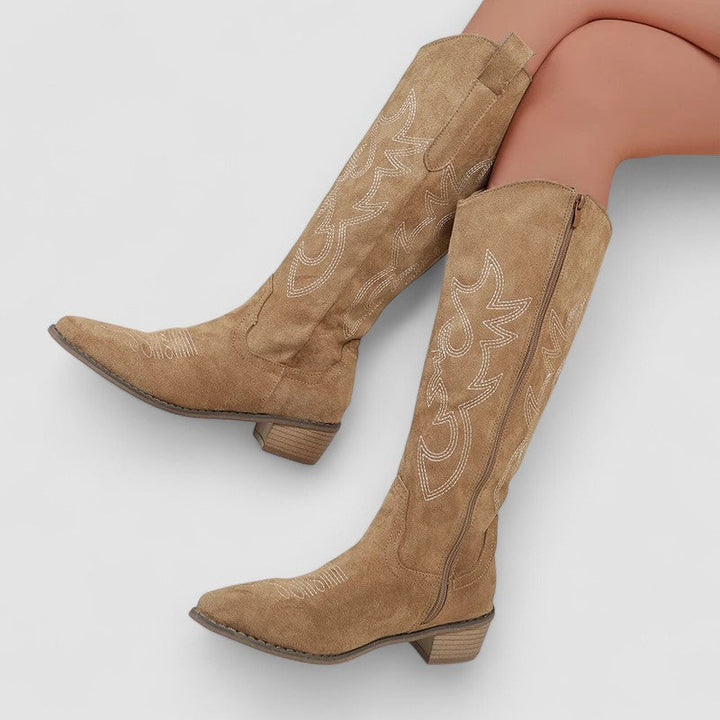 Bennett and Lowe Clara wide-calf knee-high boots for women, showcasing black leather design with a rounded toe and low heel.