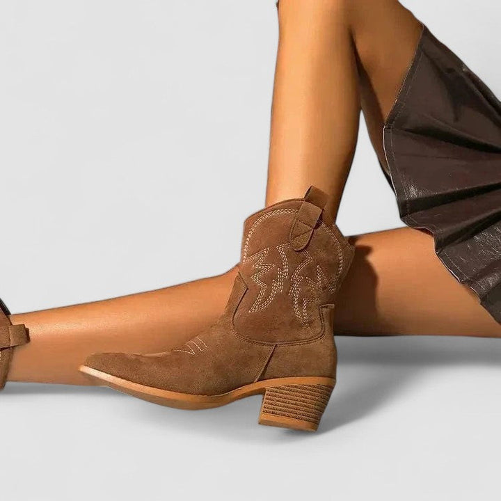 Lillian Bennett and Lowe buckle ankle boot for women with stylish design and ankle-height silhouette.