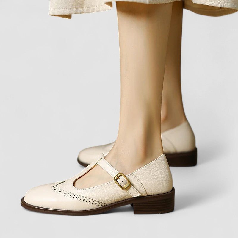 Daisy casual Mary Jane shoes by Bennett and Lowe featuring black leather straps and rounded toe on a white background.