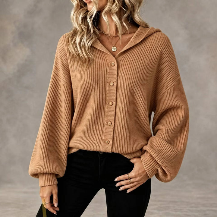 Bennett & Lowe Martha hooded button-front cardigan in soft knit with front pockets and cozy hood, displayed on a hanger.