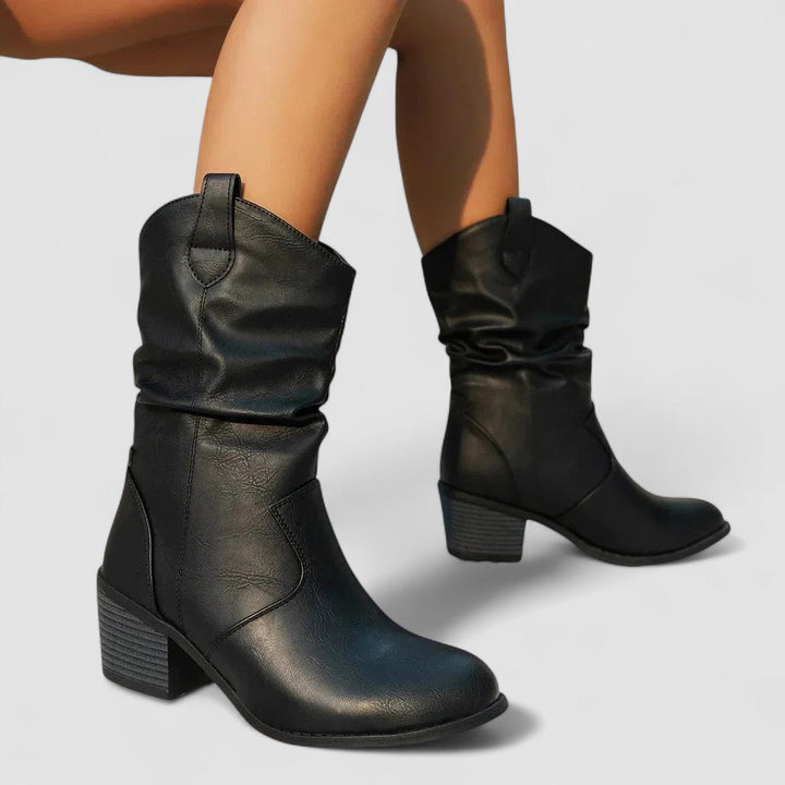 Black Vivian orthopedic leather boots for women by Bennett and Lowe, featuring a sleek design and sturdy sole.