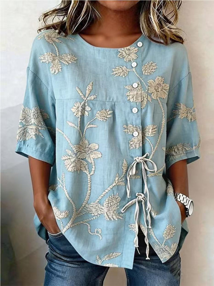 Emeline™ soft embroidered linen top by Bennett and Lowe, featuring intricate embroidery and lightweight, breathable fabric.