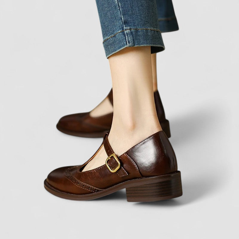 Daisy casual Mary Jane shoes by Bennett and Lowe featuring black leather straps and rounded toe on a neutral background.