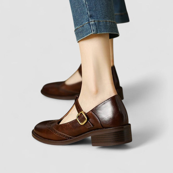 Daisy casual Mary Jane shoes by Bennett and Lowe featuring black leather straps and rounded toe on a neutral background.