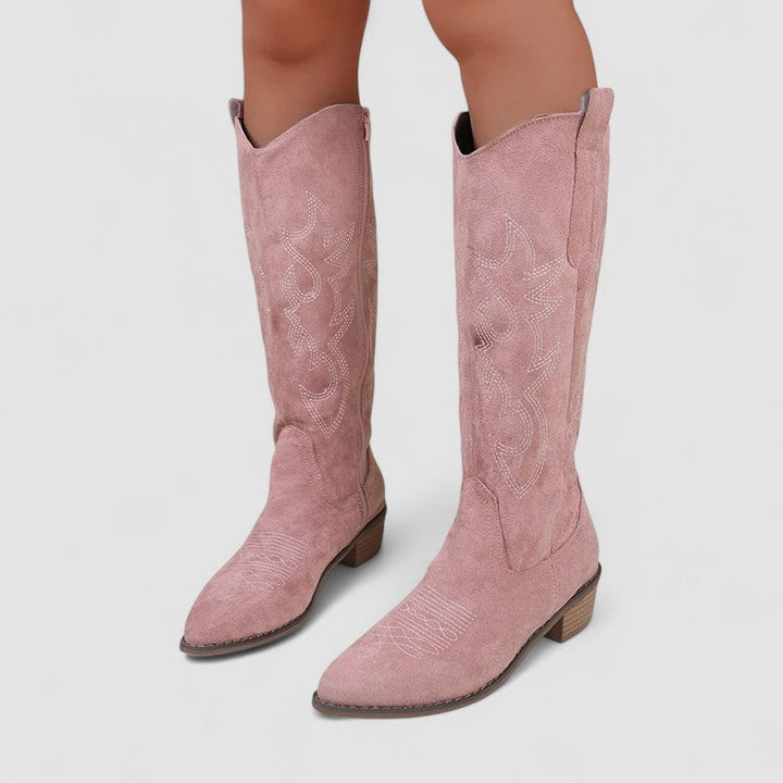 Clara wide-calf knee-high boots for women by Bennett and Lowe, featuring black leather and stylish ankle stitching.