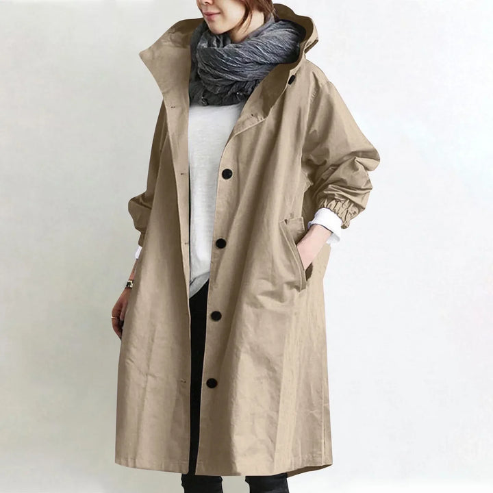 Eloise Bennett and Lowe longline trench coat with hood, stylish and lightweight, shown in a beige color with a relaxed fit.