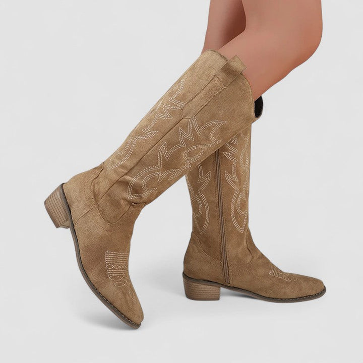 Wide-calf knee-high boots for women, Clara by Bennett and Lowe, featuring a stylish design with wide calf fit and sleek leather finish.
